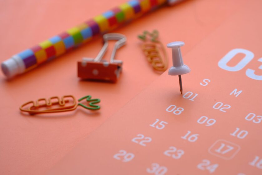 Concept illustration for a social media content calendar with color-coded themes and platform icons
